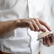 PCI Telecom | man in shirt on mobile phone